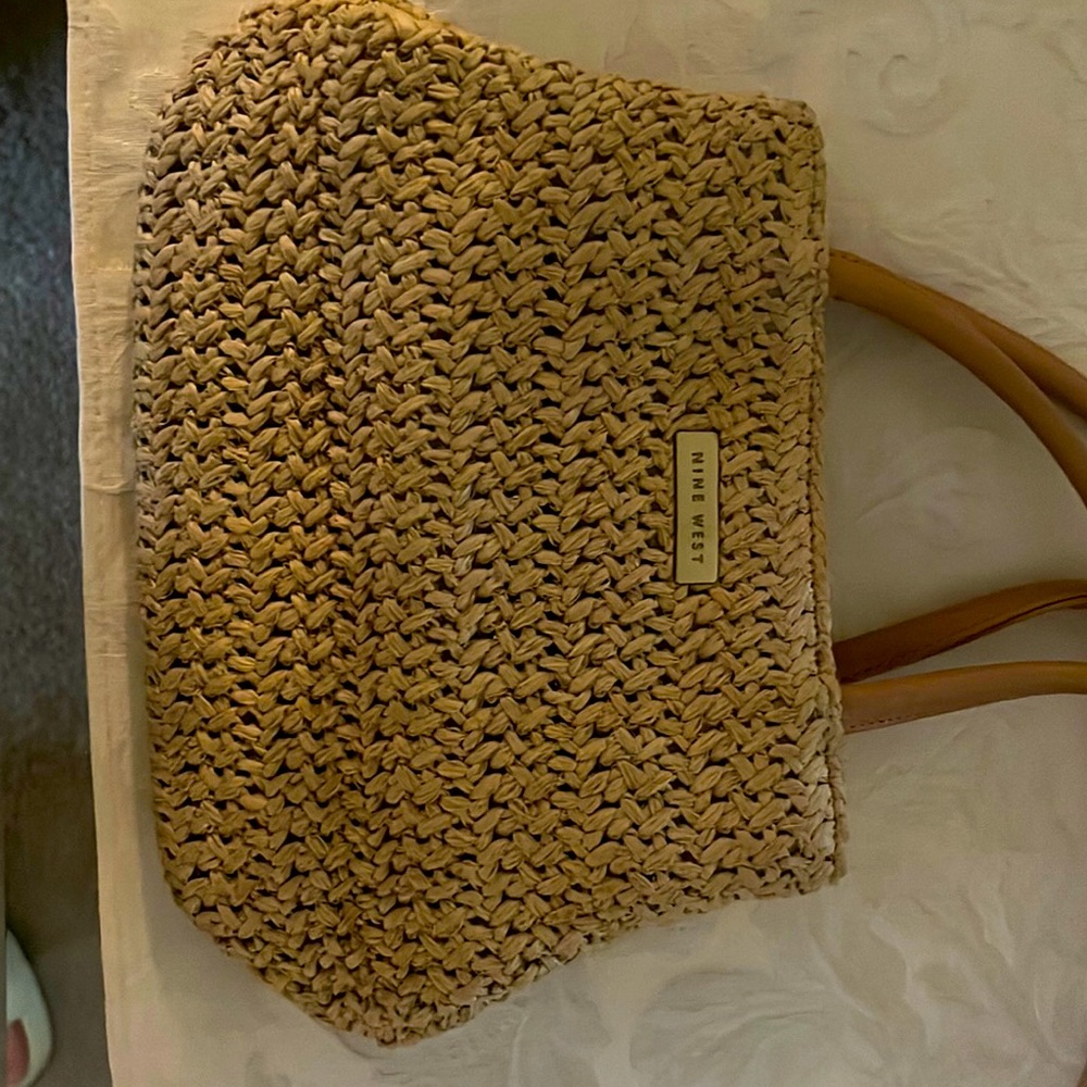 Nine West Purse. Some light usage. Small woven size in beige.